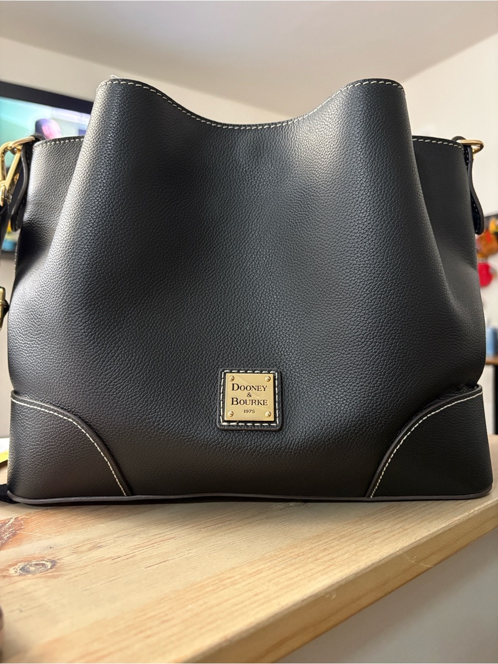 Dooney & Bourke Black Pebble Leather Shoulder Hobo with Gold Plaque
